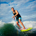 man-having-fun-with-surfboard